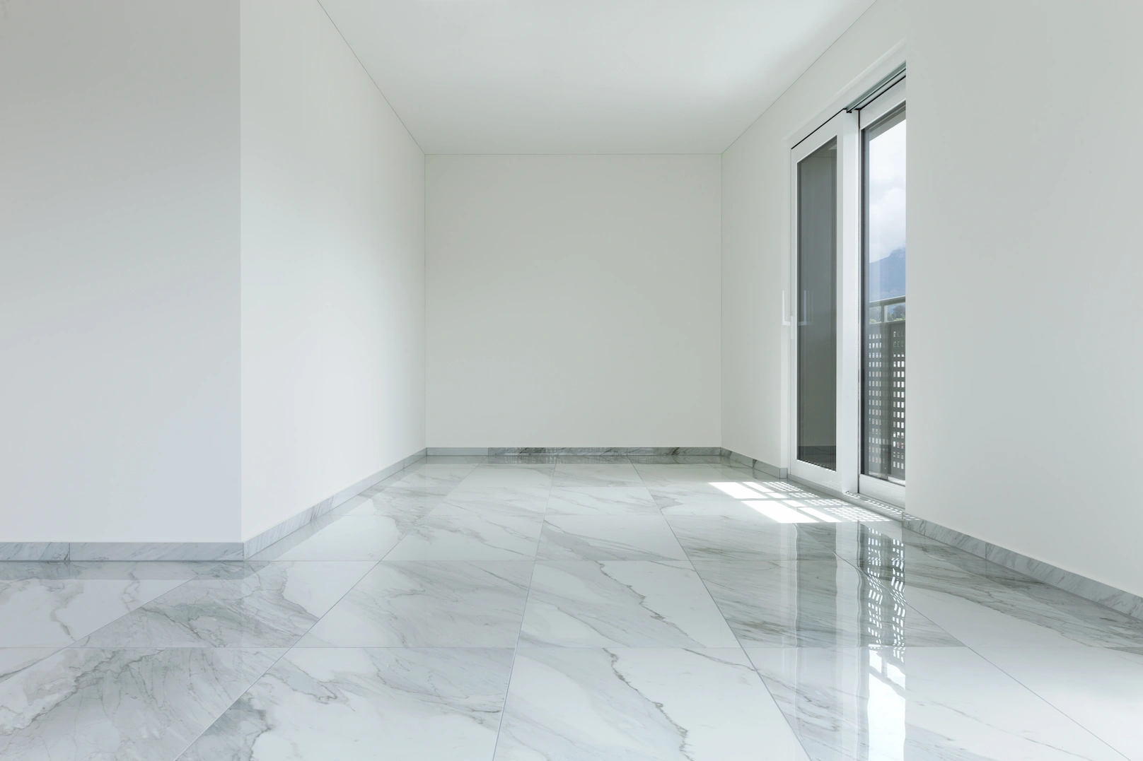 Polished marble tile flooring installation in a Fresno entryway